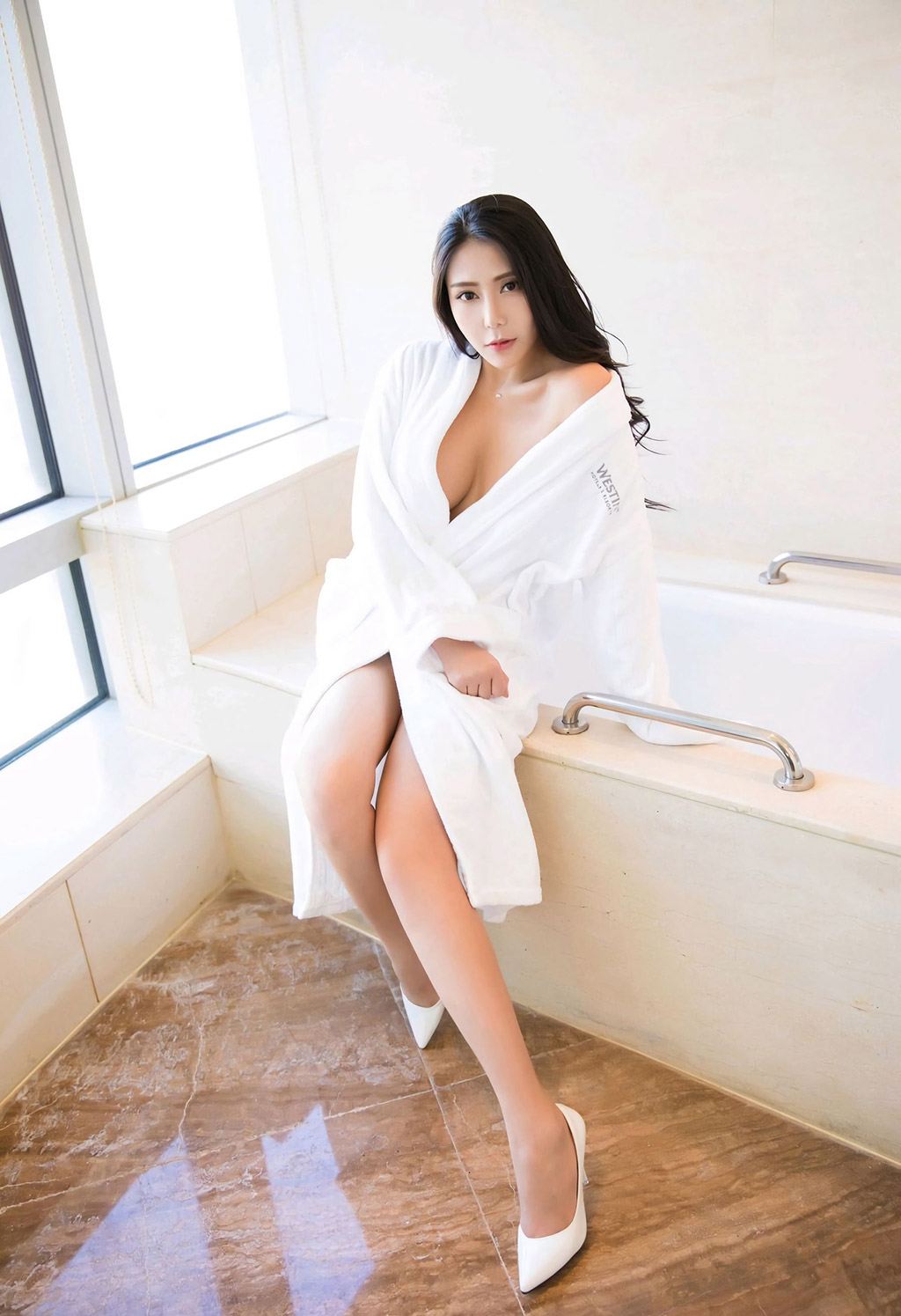 Anker's hollowed-out lingerie and the perfect huge breasts under the bathrobe.