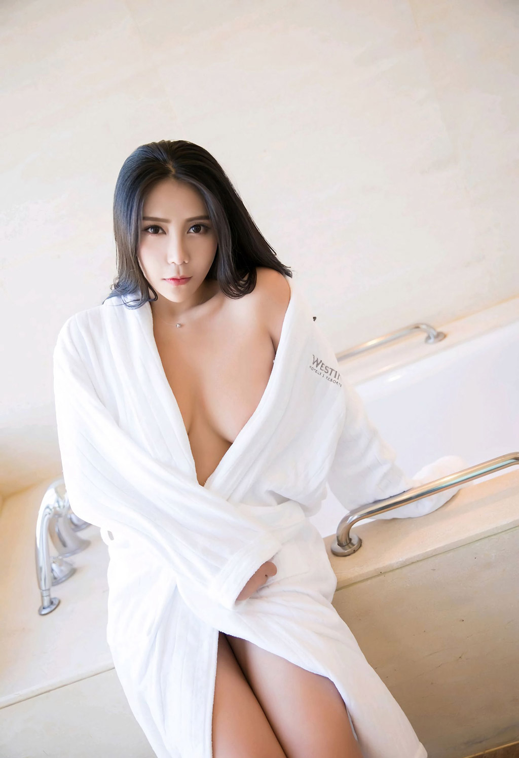 Anker's hollowed-out lingerie and the perfect huge breasts under the bathrobe.