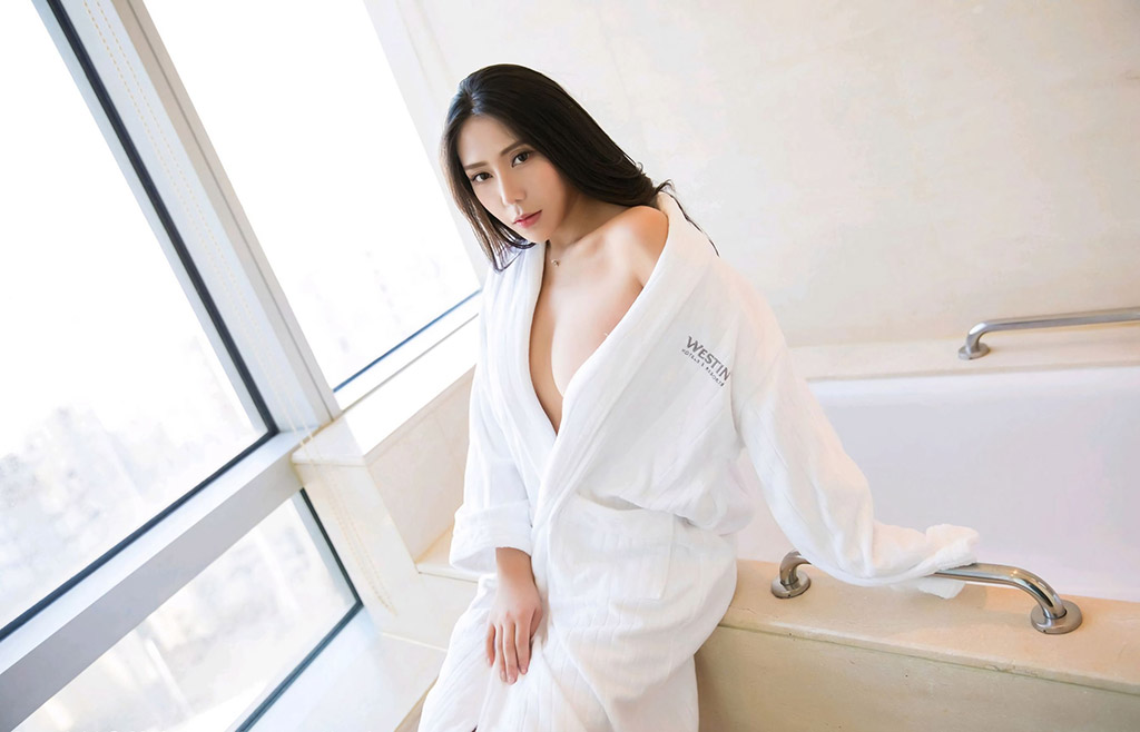 Anker's hollowed-out lingerie and the perfect huge breasts under the bathrobe.