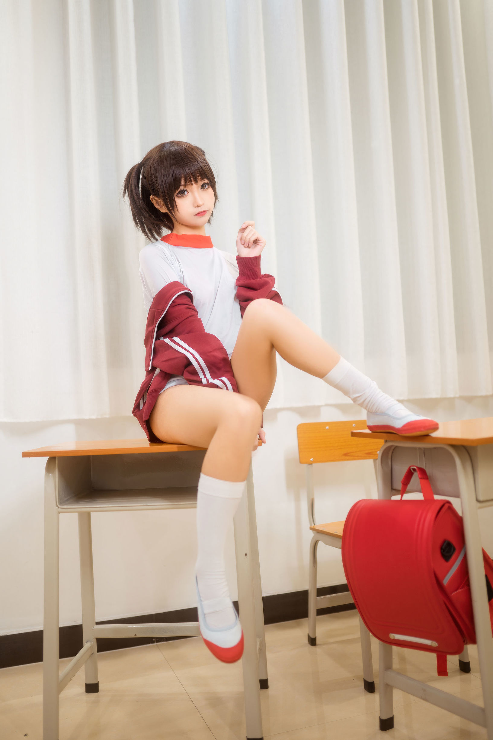 Anime blogger Chun Mo Mo red gymnastic uniform