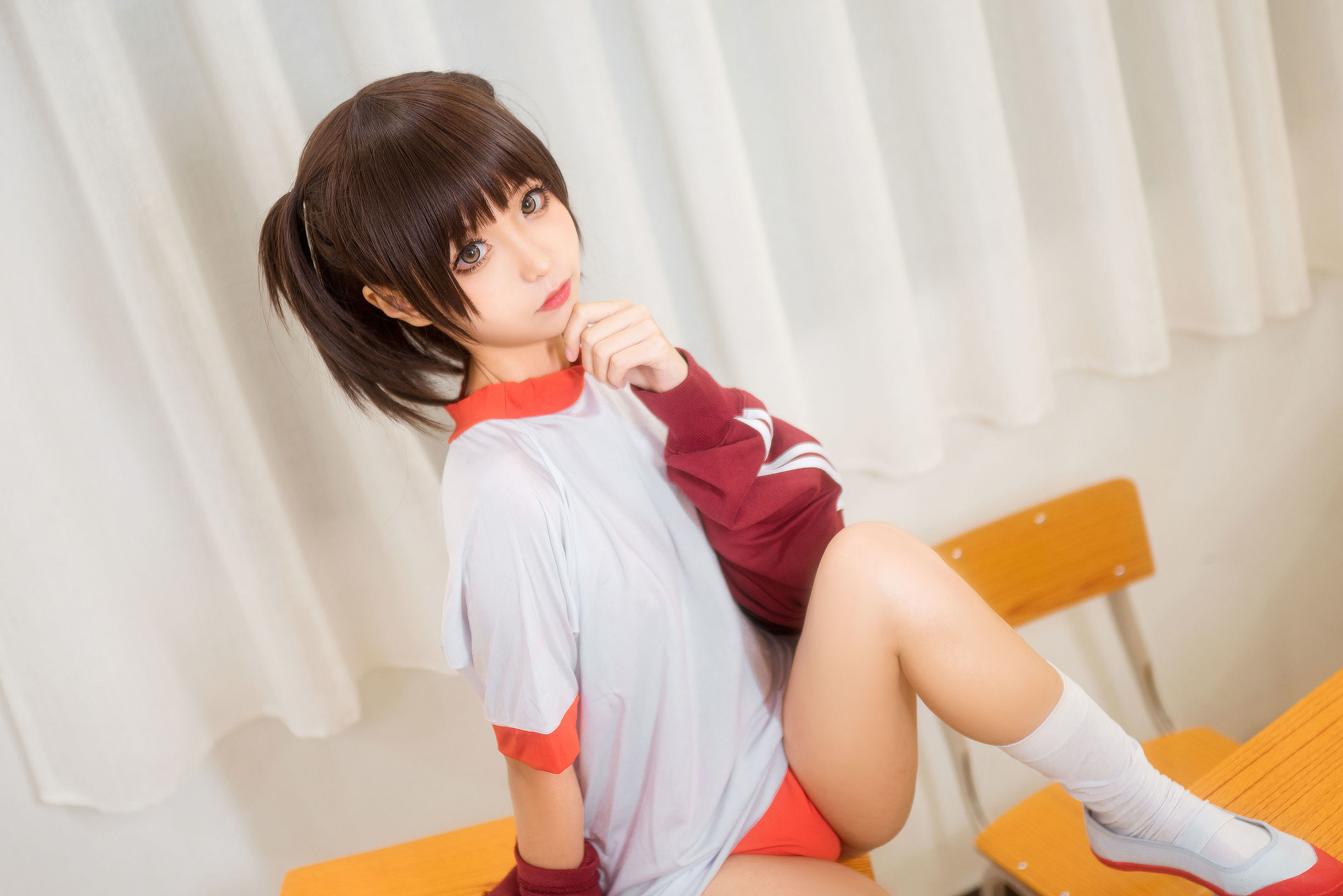Anime blogger Chun Mo Mo red gymnastic uniform