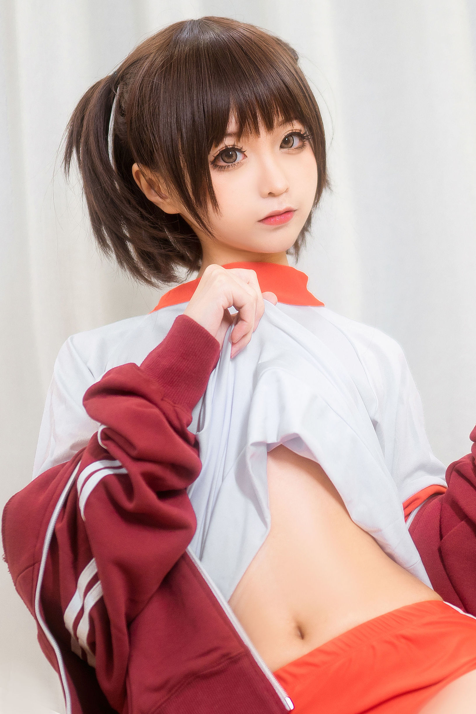 Anime blogger Chun Mo Mo red gymnastic uniform