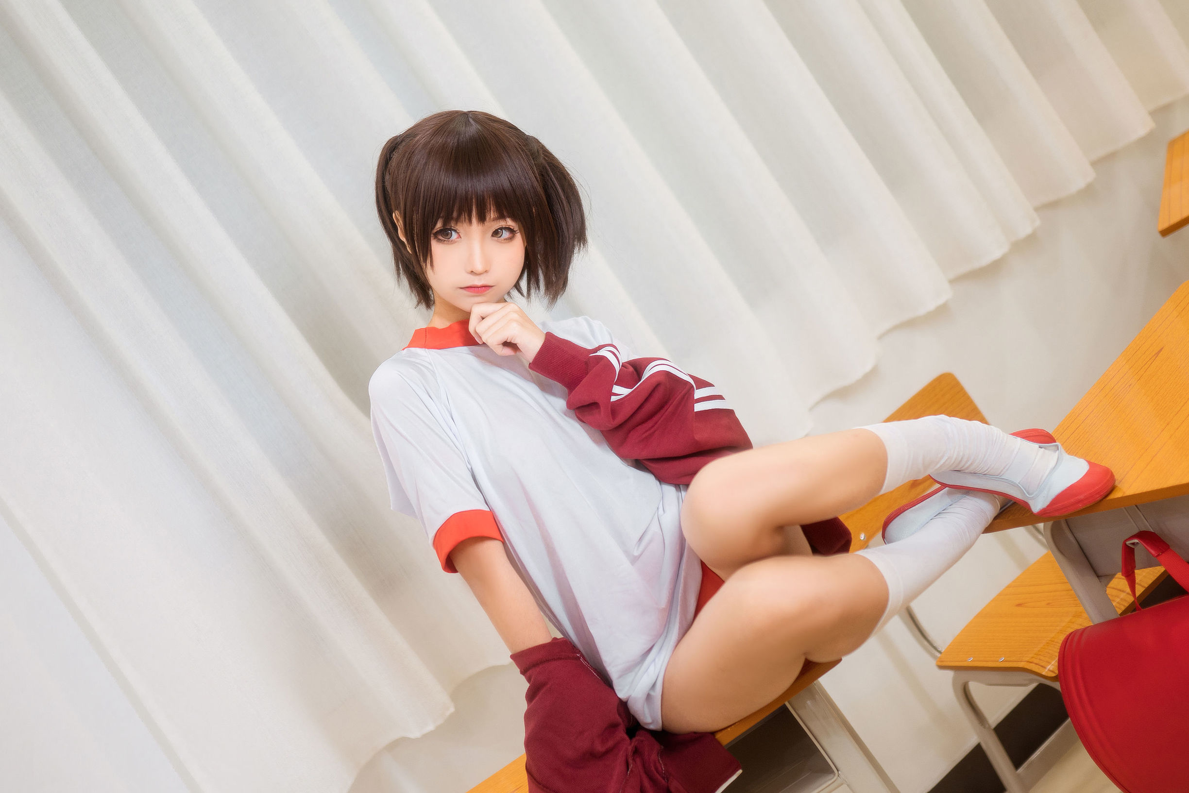 Anime blogger Chun Mo Mo red gymnastic uniform