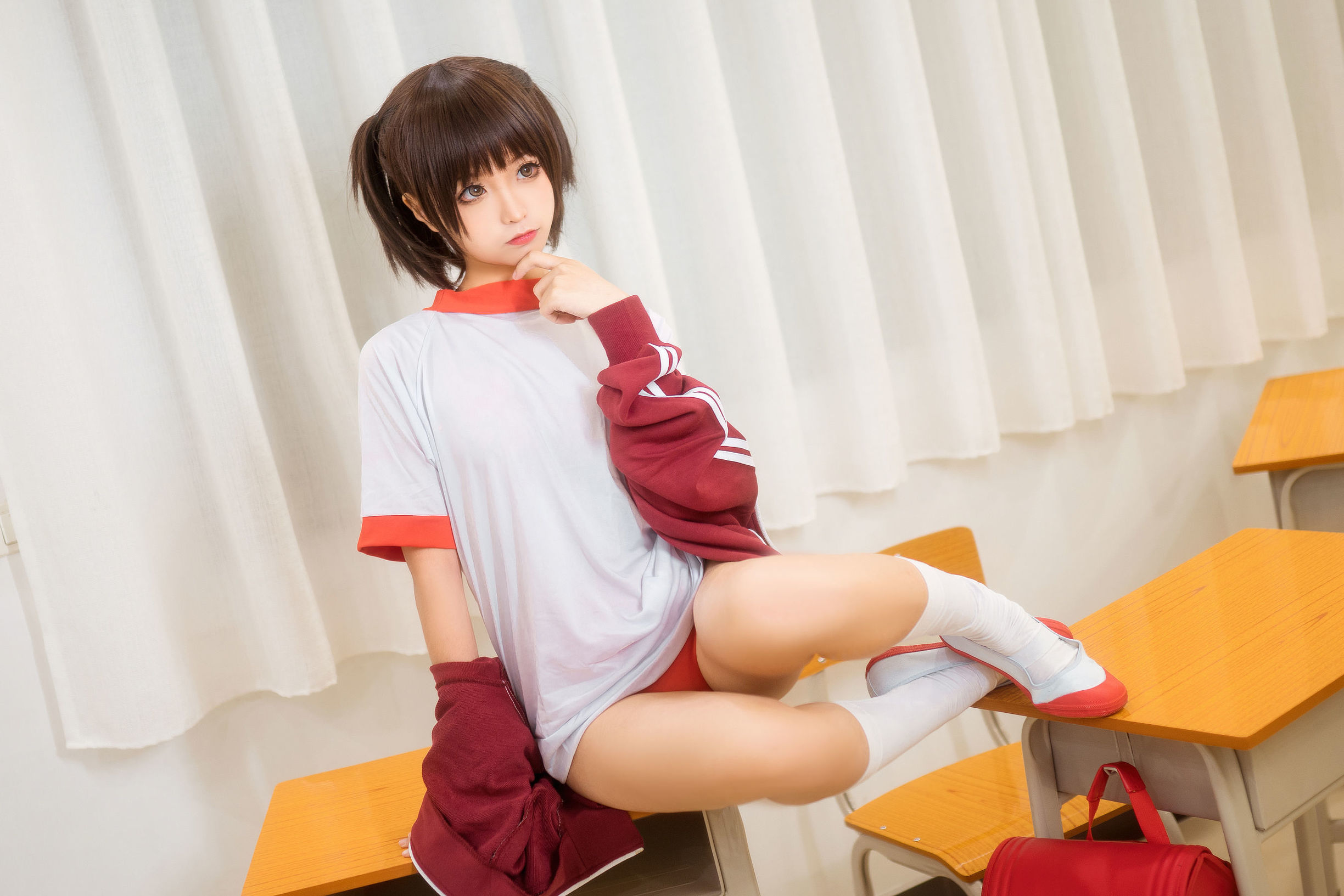 Anime blogger Chun Mo Mo red gymnastic uniform