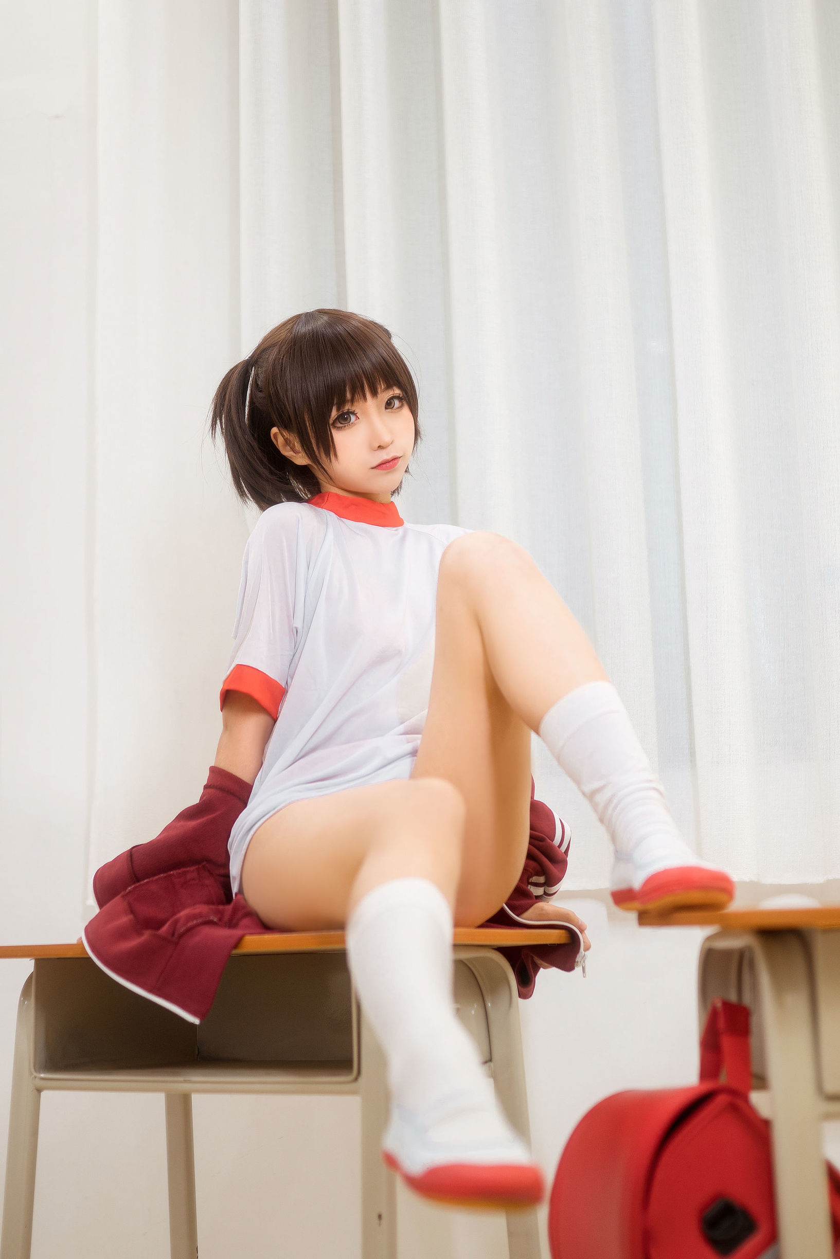Anime blogger Chun Mo Mo red gymnastic uniform