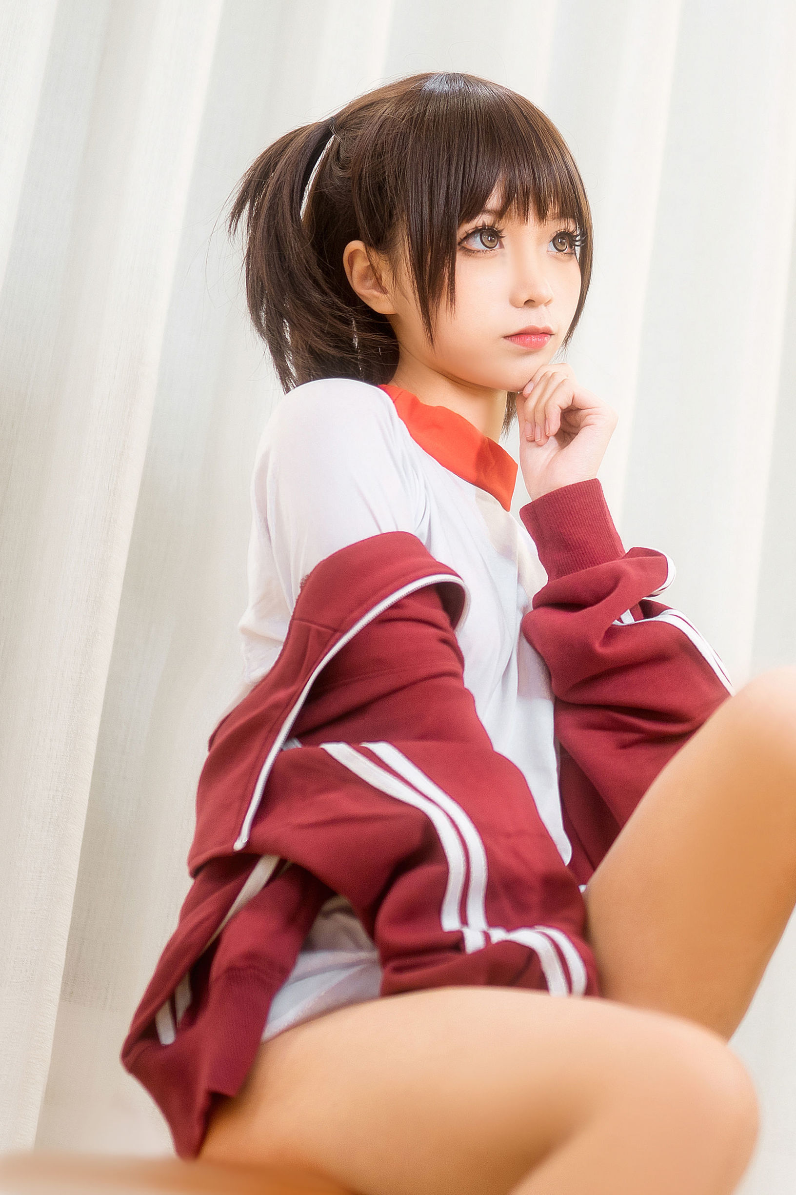 Anime blogger Chun Mo Mo red gymnastic uniform