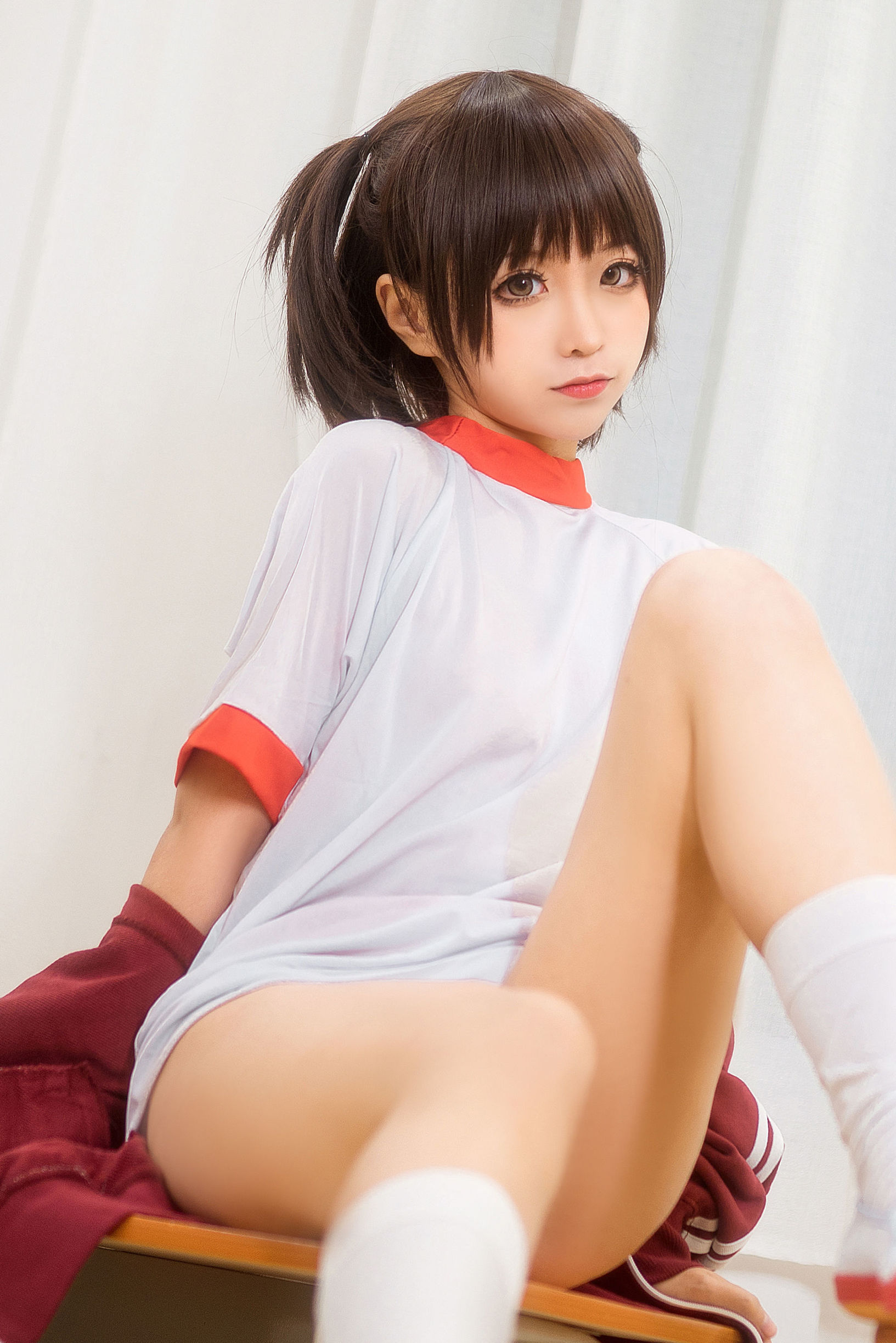 Anime blogger Chun Mo Mo red gymnastic uniform