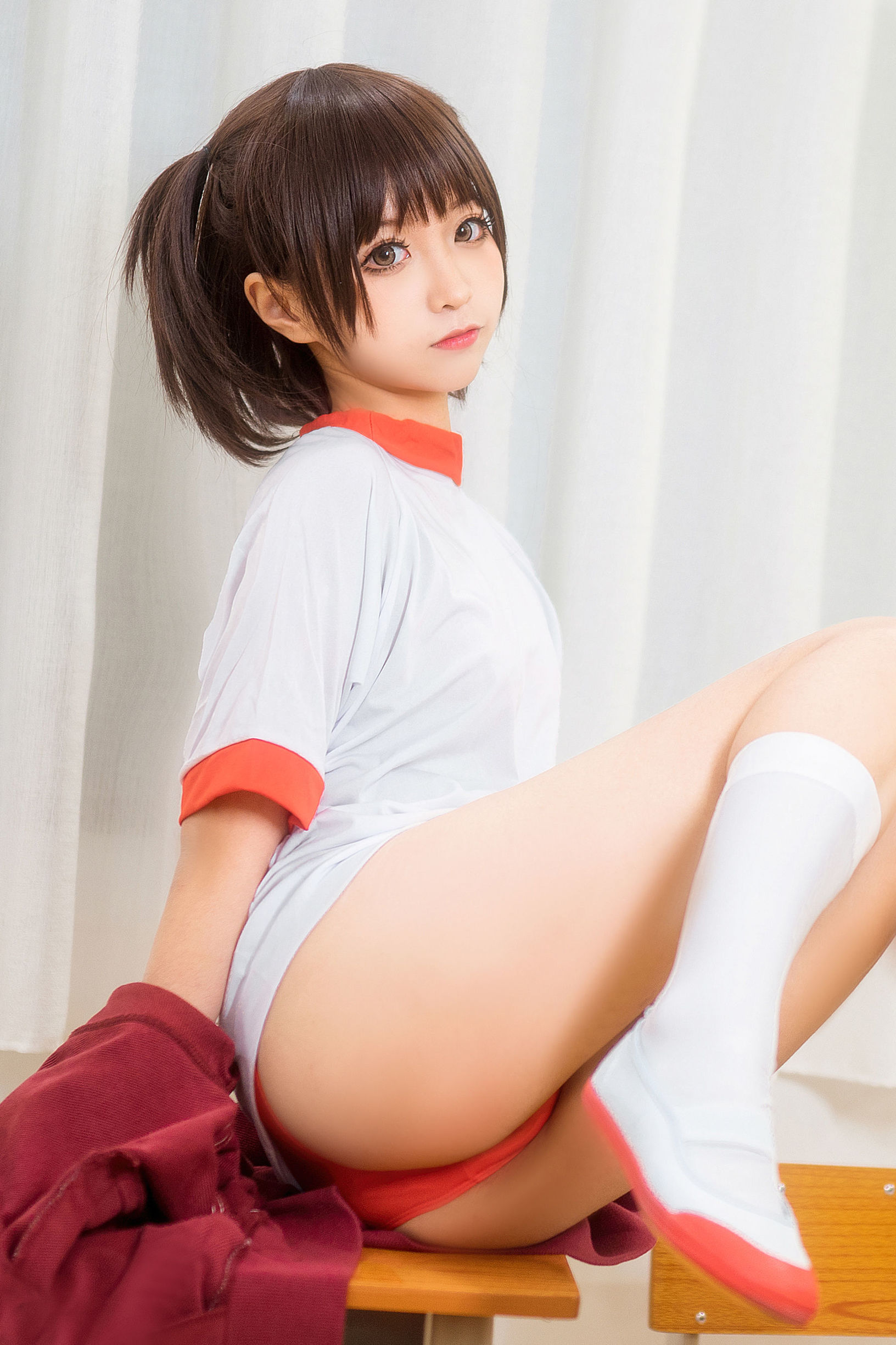 Anime blogger Chun Mo Mo red gymnastic uniform
