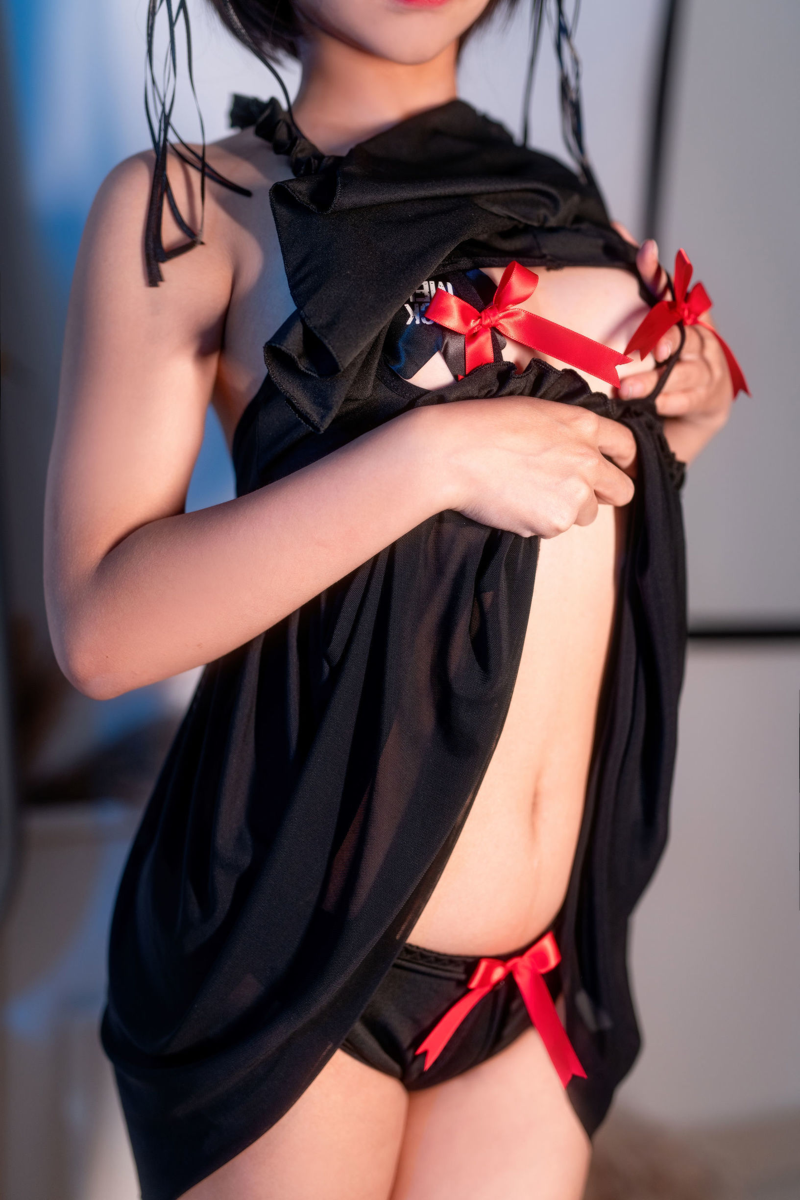 Anime blogger Chun Mo Mo black nightgown